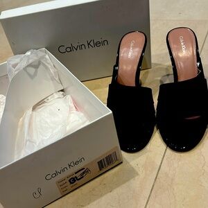 Calvin Klein black sexy sandals material like elastic but not
